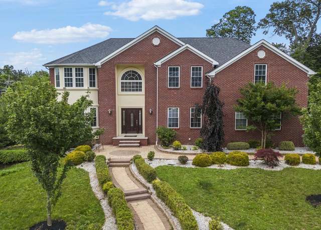 Property at 9 Pinehill Ct, East Brunswick, NJ 08816, 5 beds, 3.5 baths