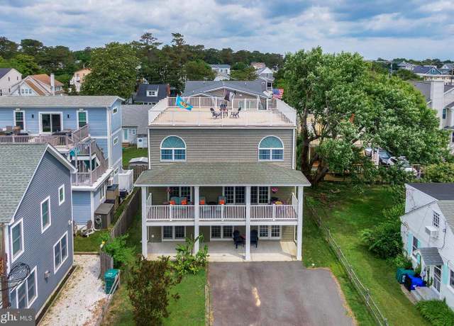 Property at 107 Swedes St, Dewey Beach, DE 19971, 5 beds, 3.5 baths