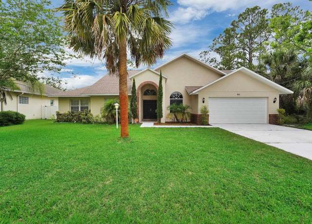 Property at 61 Brownstone Ln, Palm Coast, FL 32137, 4 beds, 3 baths