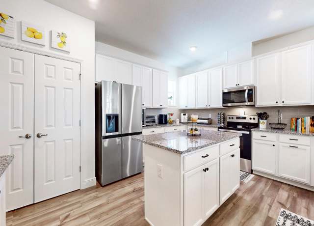 Property at 59 Oakleaf Way, Palm Coast, FL 32137-9803, 4 beds, 2 baths