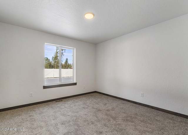 Property at 9080 W Cultivator Ave, Rathdrum, ID 83858, 3 beds, 2 baths