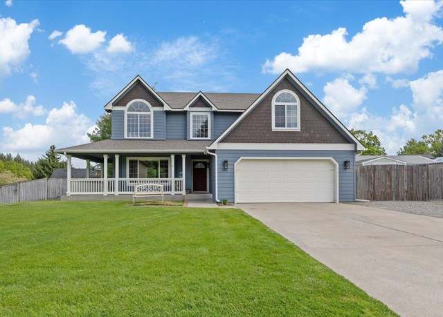 Property at 9911 E Cimmaron Dr, Spokane, WA 99206, 5 beds, 4 baths