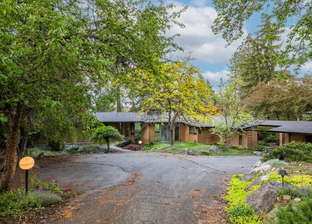 Property at 12515 E Apache Pass Rd, Spokane, WA 99206, 3 beds, 4 baths