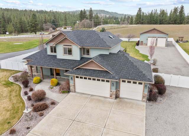 Property at 20303 E Happy Trails Ln, Otis Orchards, WA 99027, 5 beds, 4 baths