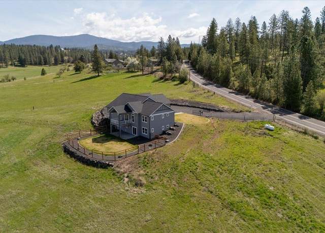 Property at 9909 E Tallman Rd, Chattaroy, WA 99003, 3 beds, 4 baths