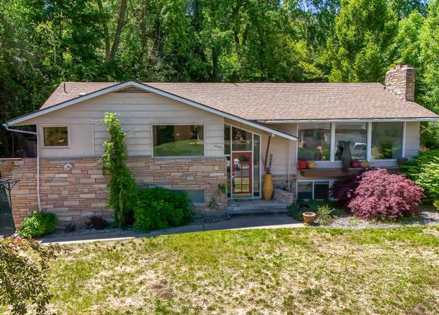 Property at 10401 N College Cir, Spokane, WA 99218, 4 beds, 3 baths