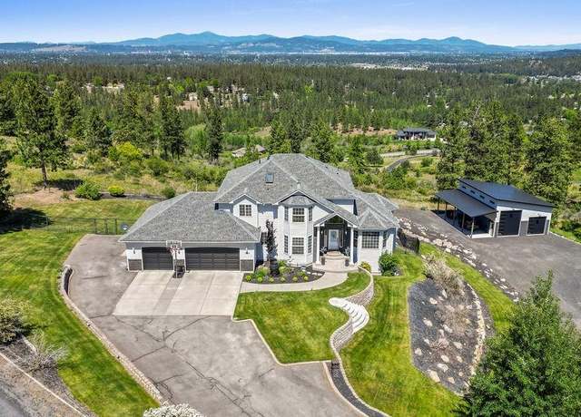 Property at 10409 E Grouse Mountain Ln, Spokane, WA 99206, 4 beds, 4 baths