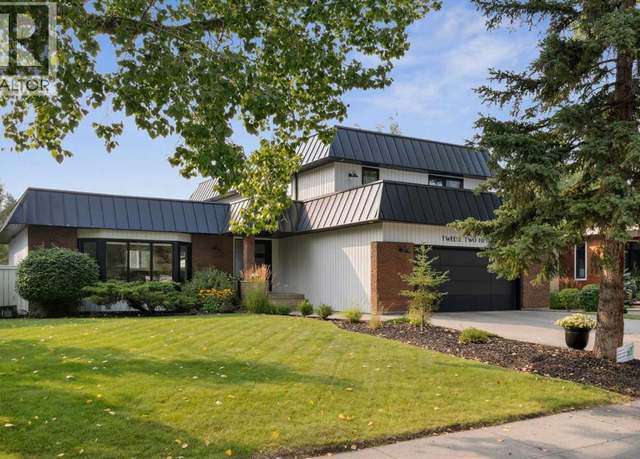 Property at 12215 Lake Erie Way Southeast, Calgary, AB T2J 2L9, 5 beds, 3.5 baths