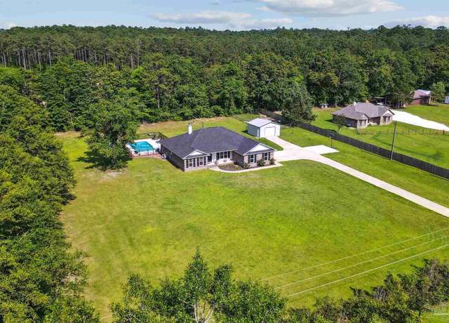 Property at 5029 Settle Rd, Molino, FL 32577, 5 beds, 3 baths