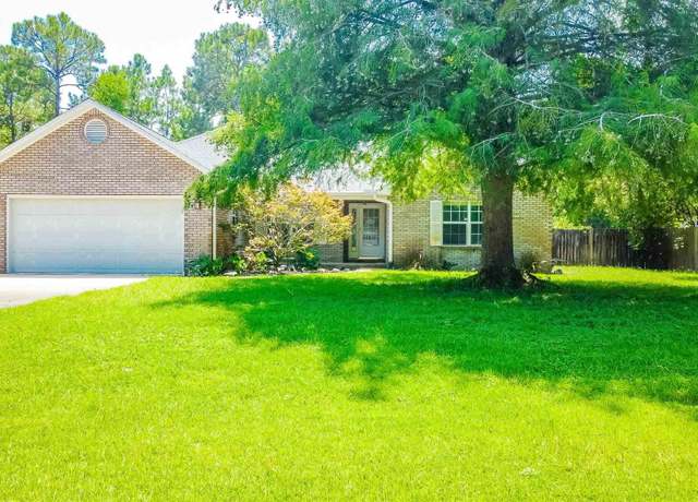 Property at 7543 Loop St, Navarre, FL 32566, 4 beds, 2 baths