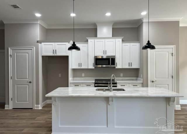 Property at 8401 Sevilla St, Navarre, FL 32566, 3 beds, 2 baths