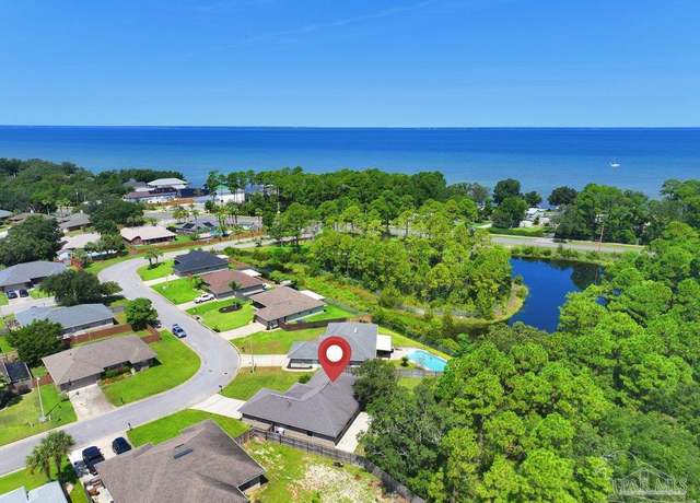 Property at 1976 Bay Pine Cir, Gulf Breeze, FL 32563, 4 beds, 2 baths