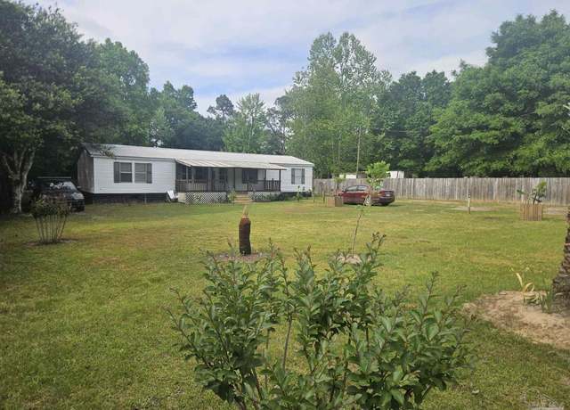 Property at 8250 Punjob Rd, Milton, FL 32583, 4 beds, 2 baths