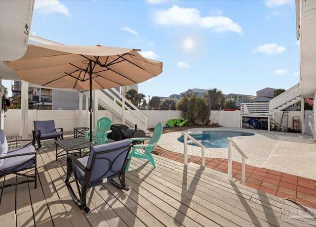 Property at 1420 Bahia Dr, Navarre Beach, FL 32566, 5 beds, 3 baths