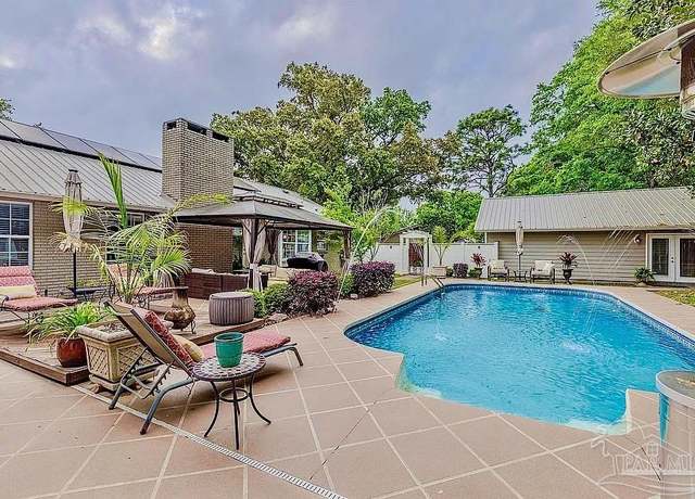 Property at 7920 Lancelot Dr, Pensacola, FL 32514, 4 beds, 4 baths