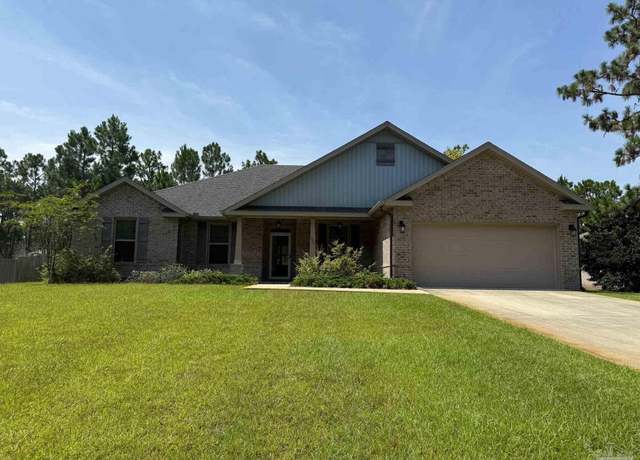 Property at 7045 Leisure St, Navarre, FL 32566, 4 beds, 3 baths