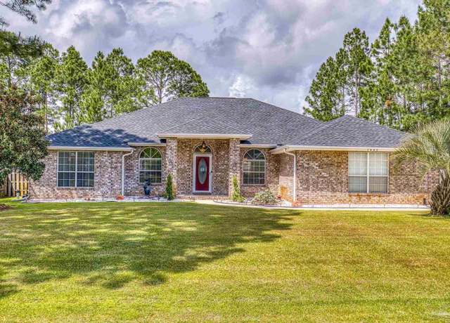 Property at 7442 Woodmont Rd, Navarre, FL 32566, 4 beds, 3 baths