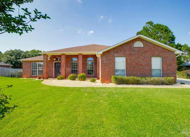 Property at 7292 Broadmoor St, Navarre, FL 32566, 4 beds, 3 baths