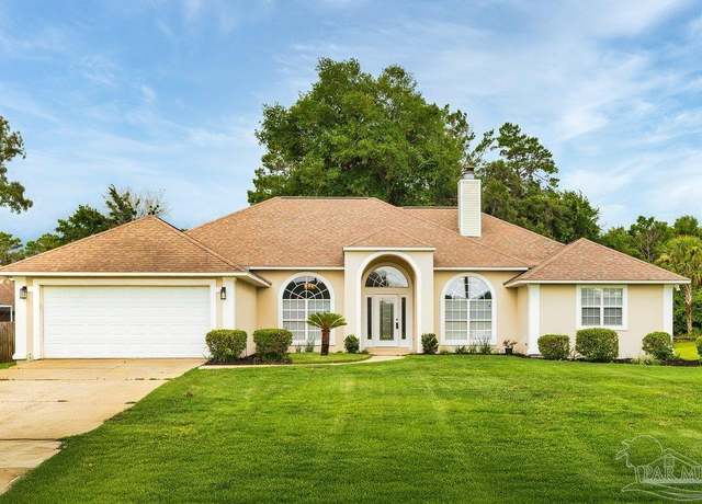 Property at 2830 Masters Blvd, Navarre, FL 32566, 3 beds, 2 baths