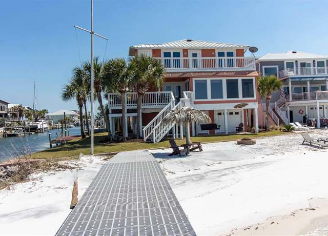 Property at 1440 Homeport Dr, Navarre Beach, FL 32566, 6 beds, 4 baths