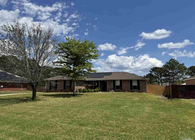 Property at 2010 Pelican Ln, Navarre, FL 32566, 4 beds, 2 baths