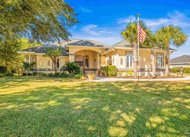 Property at 2515 Masters Blvd, Navarre, FL 32566, 4 beds, 2.5 baths