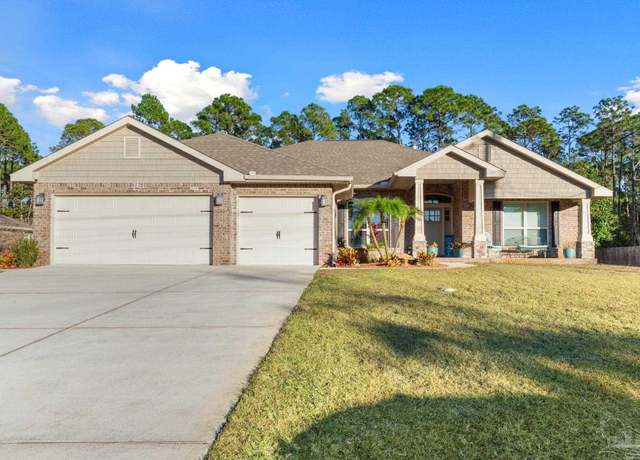 Property at 6743 Desoto St, Navarre, FL 32566, 4 beds, 3 baths