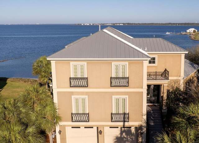 Property at 106 Matamoros Dr, Pensacola Beach, FL 32561, 4 beds, 3.5 baths