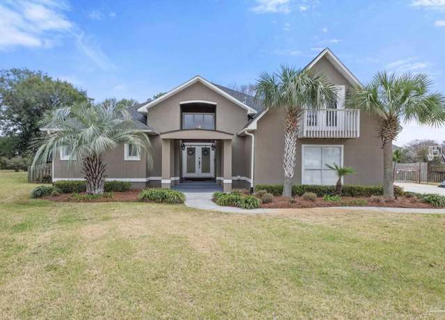 Property at 1399 Players Club Ct, Gulf Breeze, FL 32563, 5 beds, 3.5 baths