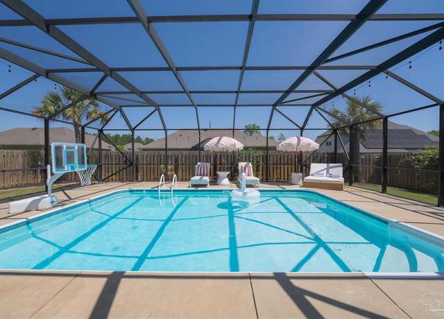 Property at 7956 Huntington Creek Ln, Pensacola, FL 32526, 4 beds, 2 baths