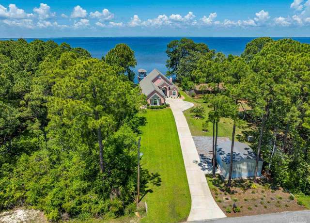 Property at 5136 Point Shores Ln, Gulf Breeze, FL 32563, 4 beds, 2 baths