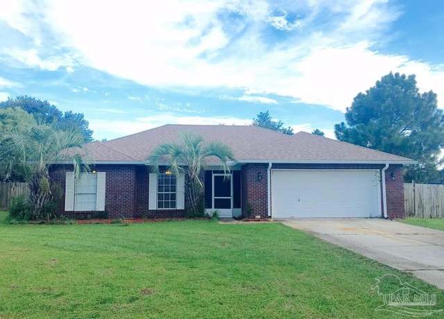 Property at 7231 Manatee St, Navarre, FL 32566, 4 beds, 3 baths