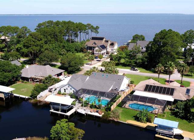 Property at 2957 Coral Strip Pkwy, Gulf Breeze, FL 32563, 4 beds, 3 baths