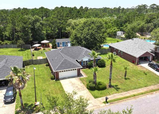 Property at 1701 Lighthouse Pointe Dr, Gulf Breeze, FL 32563, 3 beds, 2 baths