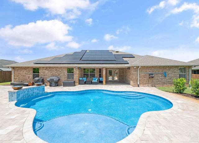 Property at 9681 Meadow Wood Ln, Navarre, FL 32566, 4 beds, 3 baths