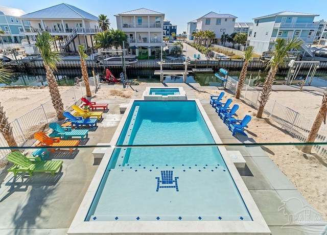 Property at 7396 Grand Navarre Blvd, Navarre Beach, FL 32566, 5 beds, 5.5 baths