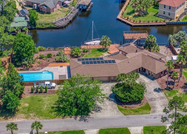 Property at 2963 Coral Strip Pkwy, Gulf Breeze, FL 32563, 5 beds, 3 baths
