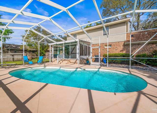 Property at 9728 Hollowbrook Dr, Pensacola, FL 32514, 4 beds, 2.5 baths