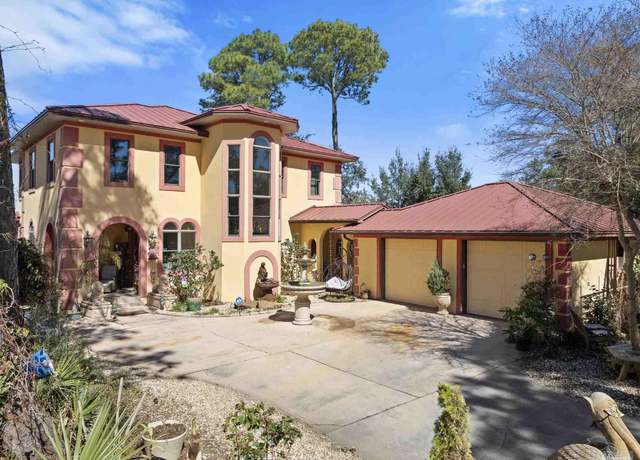 Property at 5460 N Shore Rd, Pensacola, FL 32507, 4 beds, 3 baths