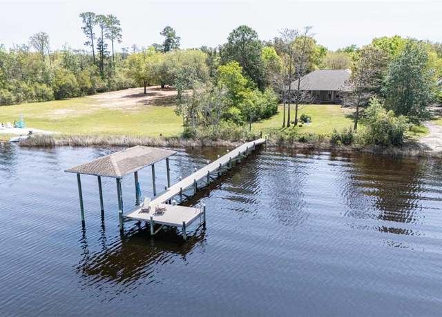 Property at 7696 Clarke St, Navarre, FL 32566, 4 beds, 3 baths