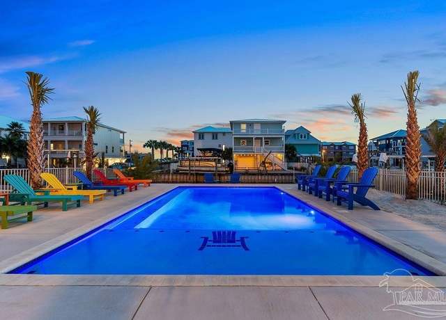 Property at 7392 Grand Navarre Blvd, Navarre Beach, FL 32566, 5 beds, 5.5 baths