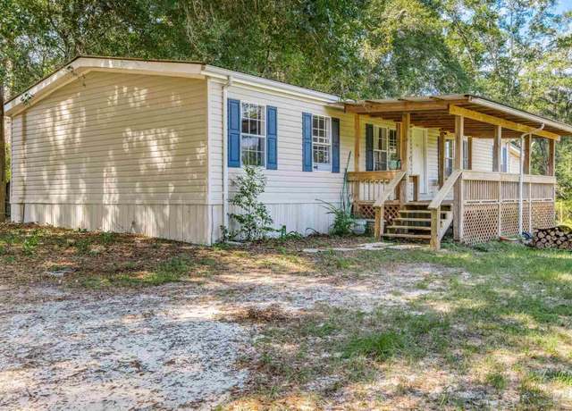 Property at 7045 Nicholson Dr, Molino, FL 32577, 3 beds, 2 baths