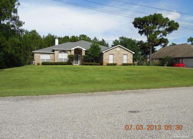 Property at 1855 Sparrow Ln, Navarre, FL 32566, 4 beds, 3 baths