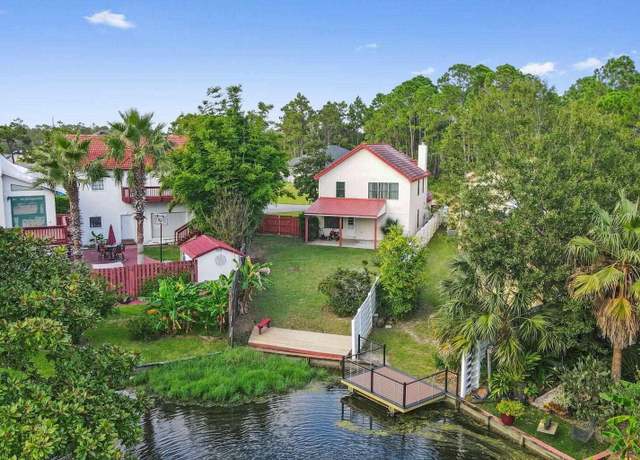 Property at 1841 E Smugglers Cove Dr, Gulf Breeze, FL 32563, 3 beds, 2.5 baths