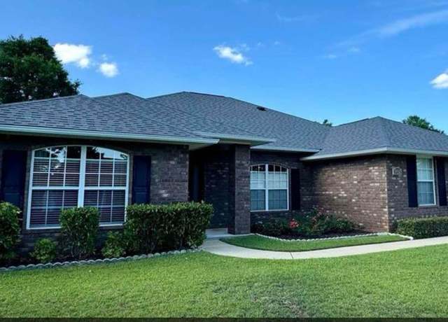 Property at 5672 Tiger Woods Dr, Milton, FL 32583, 4 beds, 3 baths