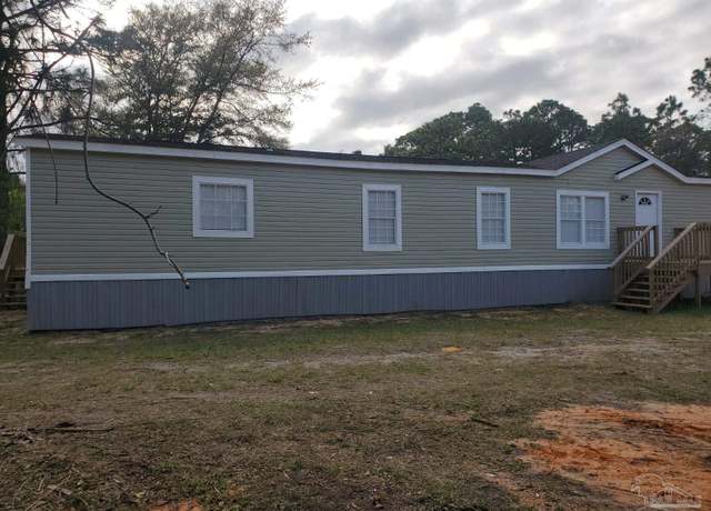 Property at 9116 Eagle Nest Dr, Navarre, FL 32566, 4 beds, 2 baths