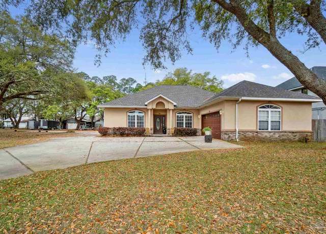Property at 1555 Ocean Breeze Ln, Gulf Breeze, FL 32563, 4 beds, 2 baths