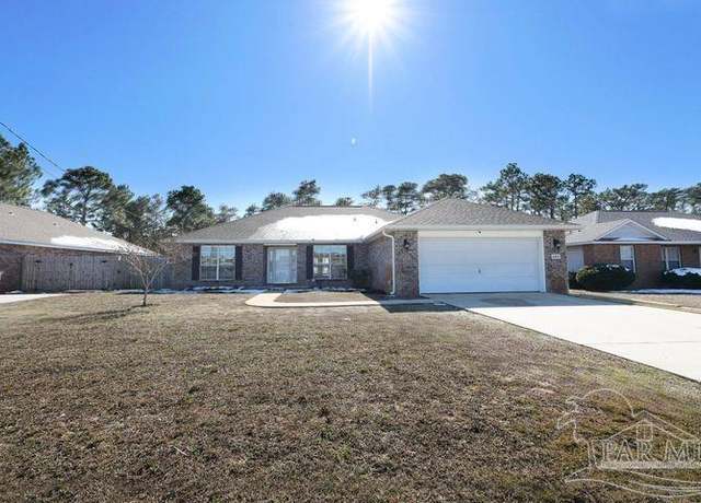 Property at 8679 High School Blvd, Navarre, FL 32566, 4 beds, 2 baths