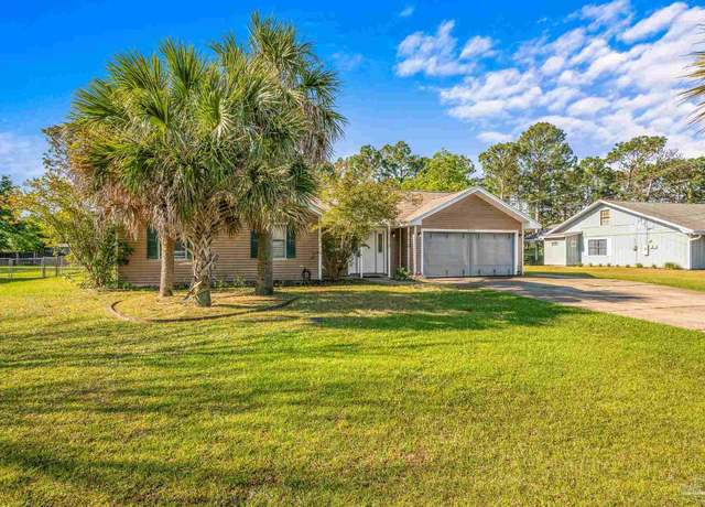 Property at 6859 Liberty St, Navarre, FL 32566, 5 beds, 3 baths