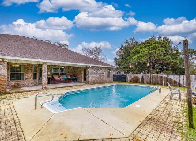 Property at 2016 Anchor Dr, Navarre, FL 32566, 4 beds, 3 baths